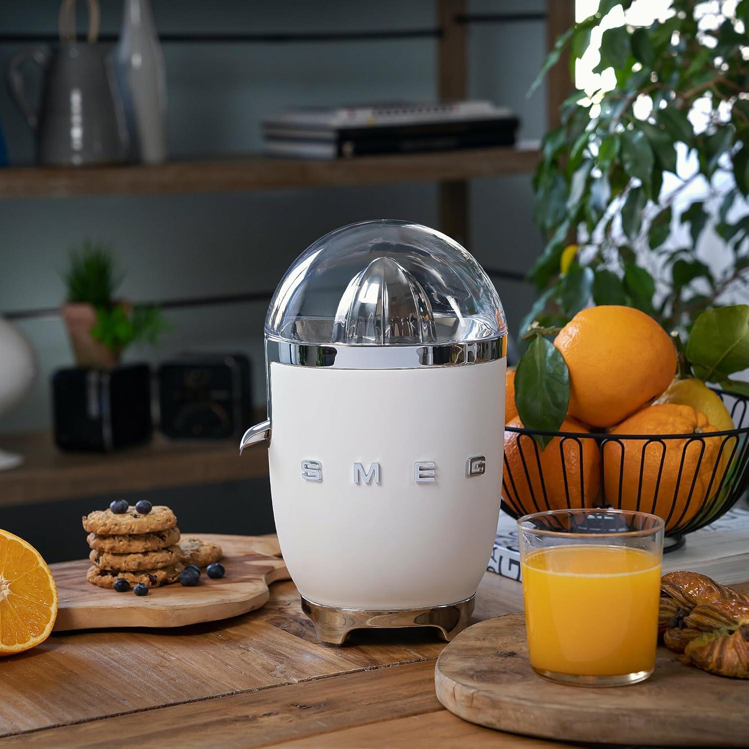 imageSMEG CJF11 Citrus Juicer Retro Style Electric Juicer with Stainless Steel Reamer AntiDrip Spout ampamp BPAFree Dome Lid Easy Clean OneTouch OperationWhite