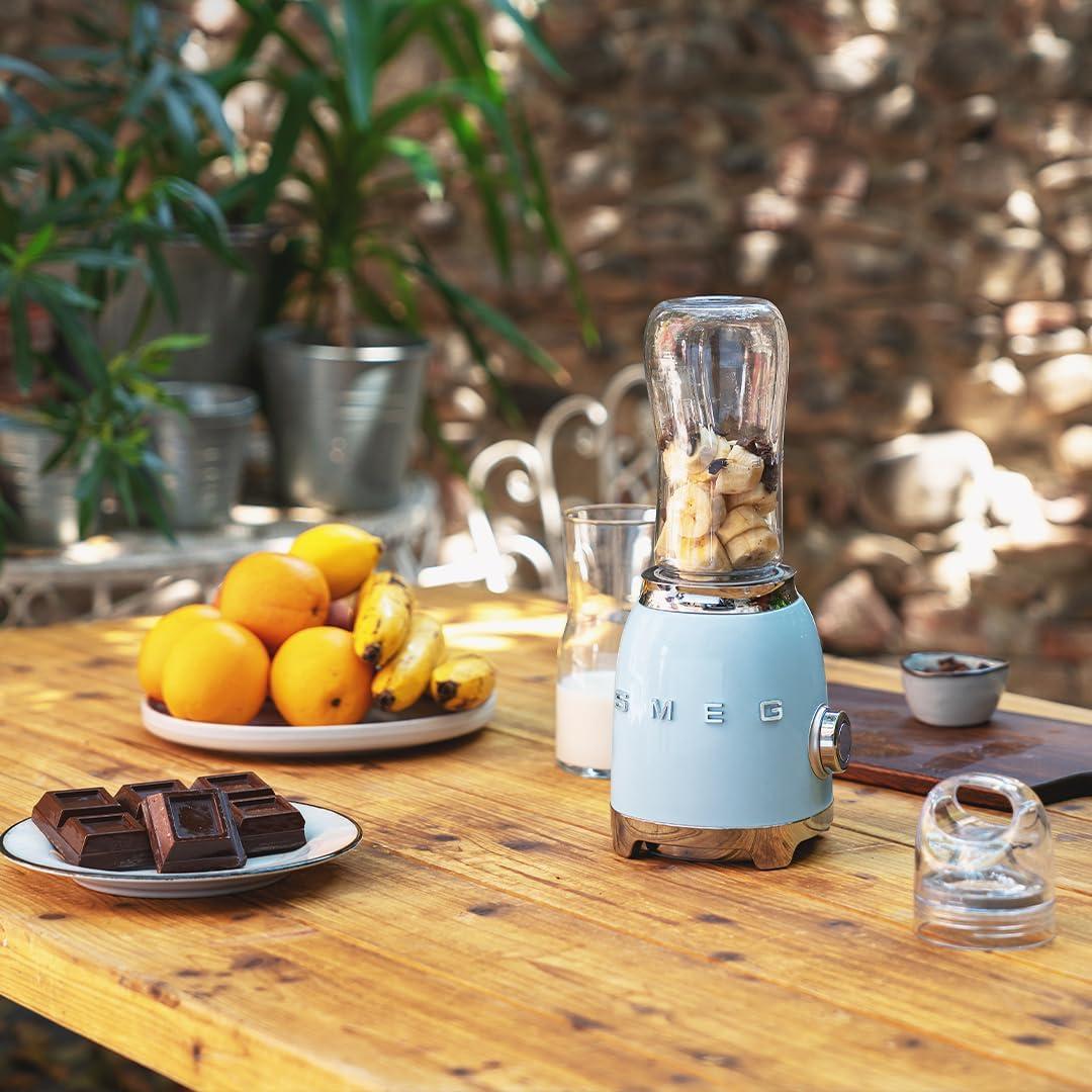 imageSMEG 50s Retro Style Personal Blender with Backlit Knob and Two BPA 600 ML Free bottles PBF01PGUS Pastel GreenPastel Blue