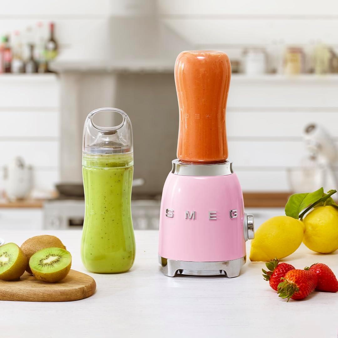 imageSMEG 50s Retro Style Personal Blender with Backlit Knob and Two BPA 600 ML Free bottles PBF01PGUS Pastel GreenPink