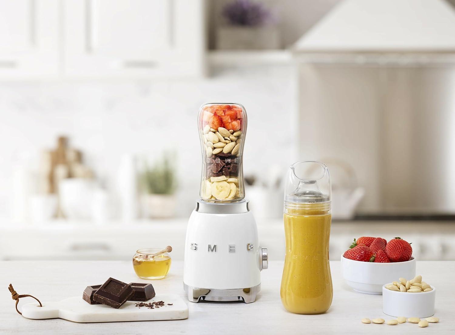 imageSMEG 50s Retro Style Personal Blender with Backlit Knob and Two BPA 600 ML Free bottles PBF01PGUS Pastel Greenwhite