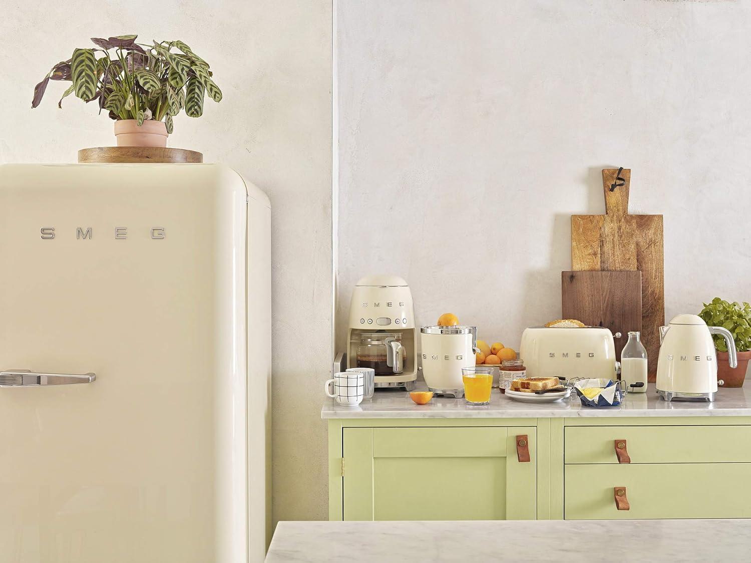 imageSmeg 50s Retro Style Aesthetic Drip Coffee Machine with 10 Cup Glass Carafe Auto Start Feature Keep Warm Plate and Two Coffee Strength Settings Pastel GreenCream